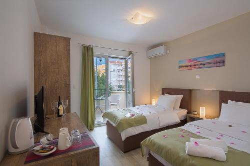 Кровать или кровати в номере Le Marc Guest house