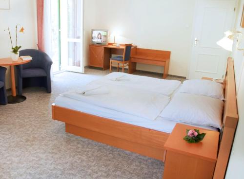 Postel nebo postele na pokoji v ubytování Hotel Del Porto