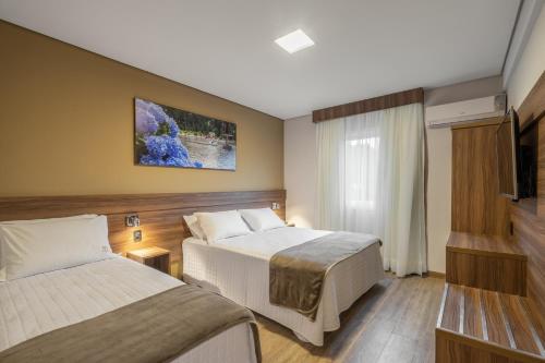Hotel Fioreze Primo - 800m da Rua Coberta — Photo of the whole room