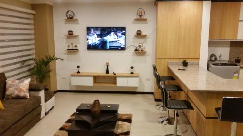 Televisyen dan/atau pusat hiburan di Condominio La Victoria, Departamento en Cuenca 4