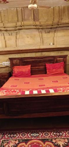 Postel nebo postele na pokoji v ubytování Hotel Deep Mahal