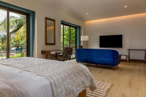 Ein Bett oder Betten in einem Zimmer der Unterkunft Ashore by Vista, Beachfrom 6BHK, ultra luxurious with Infinity pool, SPA at Morjim