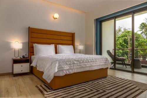 Ein Bett oder Betten in einem Zimmer der Unterkunft Ashore by Vista, Beachfrom 6BHK, ultra luxurious with Infinity pool, SPA at Morjim