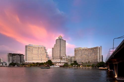 a view of a city with a river and buildings at Shangri-La Bangkok in Bangkok