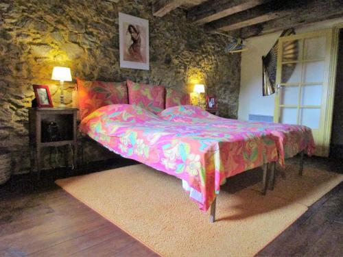 Postel nebo postele na pokoji v ubytování Le petit Fort Fleuri