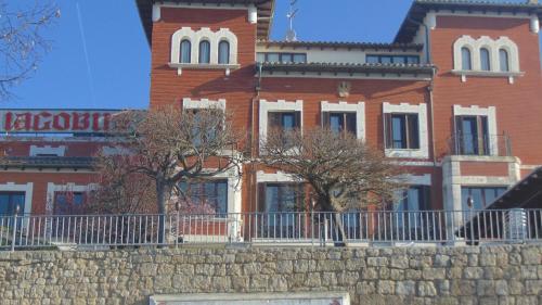 a large building with a large window on top of it at Iacobus in Castrojeriz