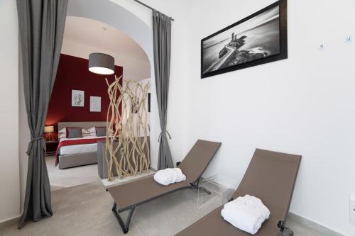Кровать или кровати в номере Bespoke Roma Suites