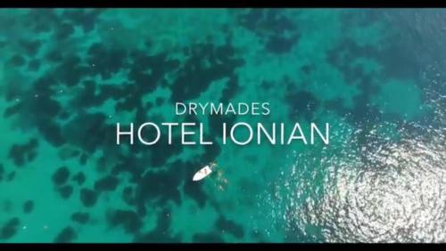 a picture of the ocean with the words hotel london at Hotel Ionian in Dhërmi