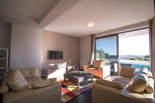 Istumisnurk majutusasutuses Villa Sunrise Premantura Sea View