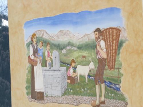 un dipinto di una famiglia in piedi in un campo di Albergo Eden a Ponte di Legno