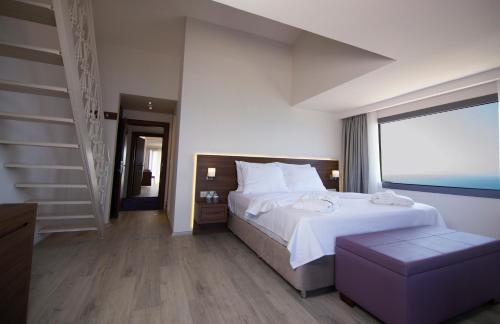 Ένα ή περισσότερα κρεβάτια σε δωμάτιο στο Neopol Hotel