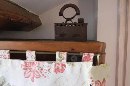 a mirror sitting on top of a bed at Apartments Authentic Baska in Baška