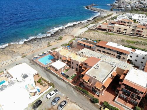 an aerial view of a resort next to the ocean at Koutrakis Suites by Estia in Sissi