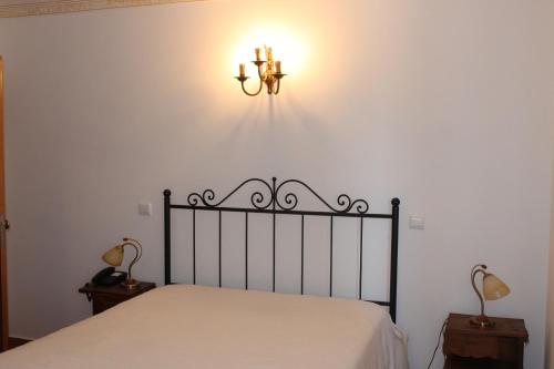 Katil atau katil-katil dalam bilik di "O Viajante" Low Cost Hotel