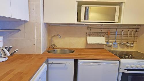 Kjøkken eller kjøkkenkrok på Cortina - Cimes & Neige
