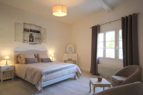 Ένα ή περισσότερα κρεβάτια σε δωμάτιο στο Le clos de Chaussy