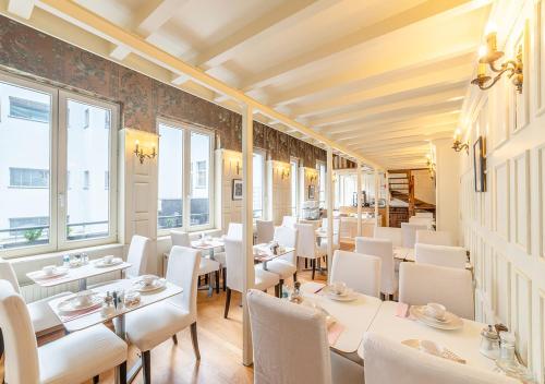 Posezení v ubytování Hotel La Legende