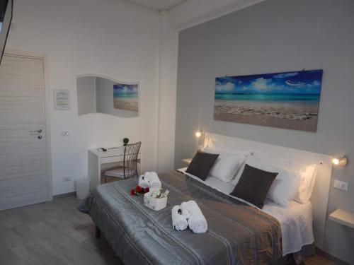Postel nebo postele na pokoji v ubytování B&B 36 Passi dal Mare