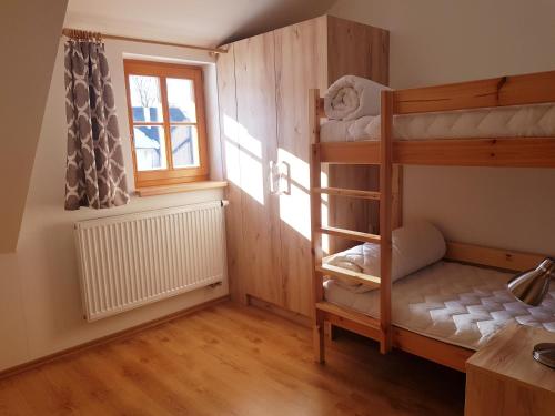 Postel nebo postele na pokoji v ubytování Apartmány Prima Nova Lake