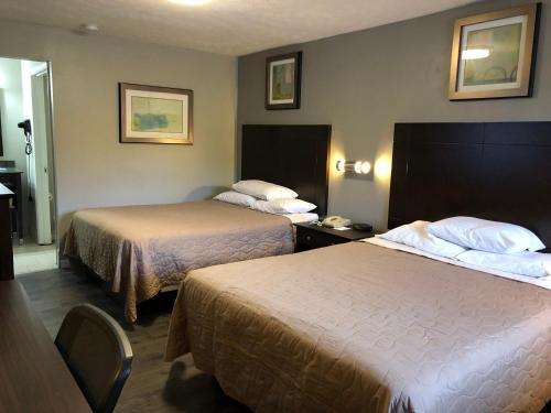 Postelja oz. postelje v sobi nastanitve Deerfield Inn and Suites - Fairview