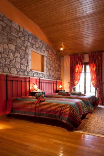 Postel nebo postele na pokoji v ubytování Hotel Kynaitha