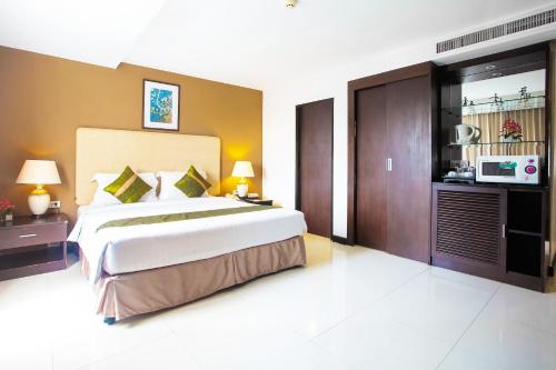 Krevet ili kreveti u jedinici u okviru objekta The Patra Hotel - Rama 9