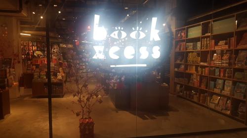 a book store with a sign in the window at D'Kroll Tamarind Cyberjaya 1 Bedroom Premium Suite with Netflix in Cyberjaya