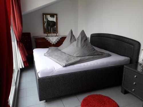 Postel nebo postele na pokoji v ubytování Gästehaus Strandkonsulat