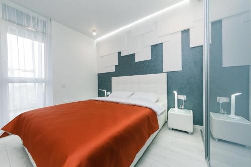 เตียงในห้องที่ Новый дом, ЖК" Французский квартал 2" Панораный вид, 20 этаж