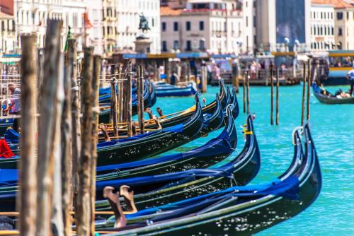 a group of gondolas parked in the water at Mon Repos in Lido di Jesolo