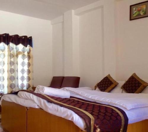 Postel nebo postele na pokoji v ubytování Hotel D'Zojila