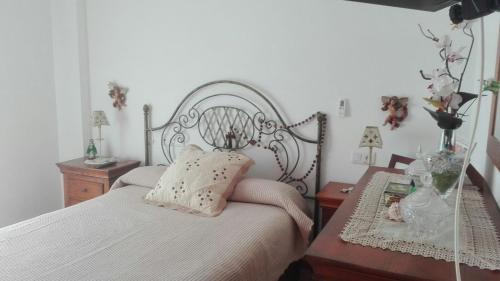 Giường trong phòng chung tại Apartamento turístico en C/ Los Barquicos