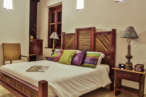 
Un ou plusieurs lits dans un hébergement de l'établissement Casa de Isabella, a Kali Hotel
