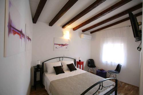 Postel nebo postele na pokoji v ubytování Rooms Beljan