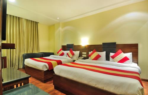 Cama o camas de una habitación en Hotel Aura - New Delhi Railway Station