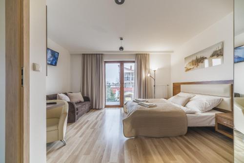 Posezení v ubytování Apartamenty i Pokoje Gościnne Relax