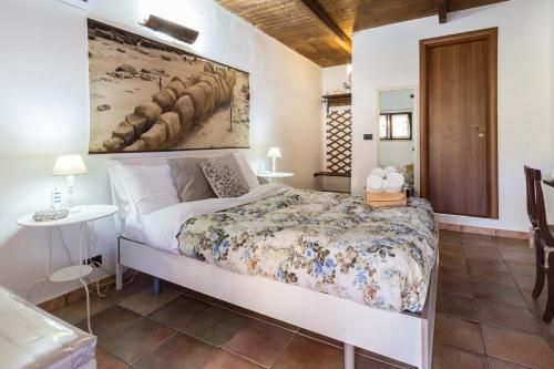 Postel nebo postele na pokoji v ubytování B&B Eyexei Domus