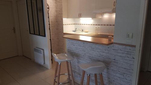 Η κουζίνα ή μικρή κουζίνα στο CYBELE APARTMENT - HYPER CENTRE
