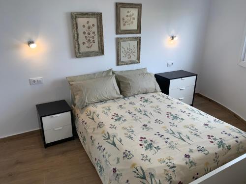 A bed or beds in a room at Paseo Marítimo, Los Cristianos Over the sea FREE WIFI