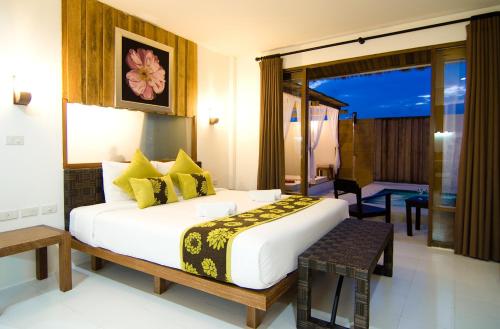 Postel nebo postele na pokoji v ubytování Lawana Escape