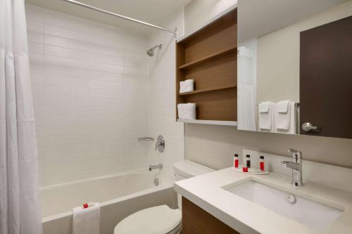 A bathroom at Microtel Inn & Suites by Wyndham Oyster Bay Ladysmith