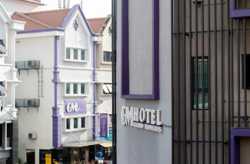 a group of buildings on a city street at GM Grand Moments Bandar Sunway in Petaling Jaya