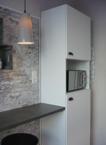 Privatzimmer Spahn in Mühlheimにあるキッチンまたは簡易キッチン
