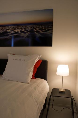 Postel nebo postele na pokoji v ubytování Leopold5 Luxe-Design Apartment