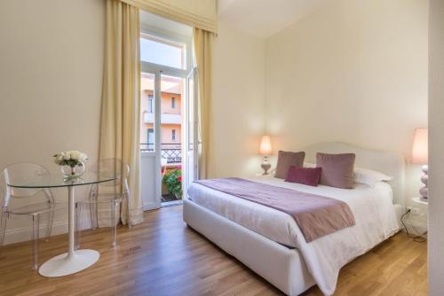 Una cama o camas en una habitación de BB22 Cagliari