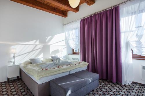 Postel nebo postele na pokoji v ubytování Hotel Salety