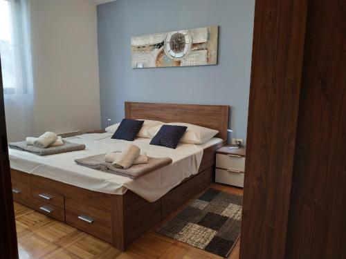Postel nebo postele na pokoji v ubytování Apartment Lavanda Nova