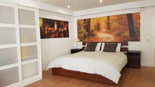 En eller flere senge i et værelse på Apartment Plaza Del Salvador