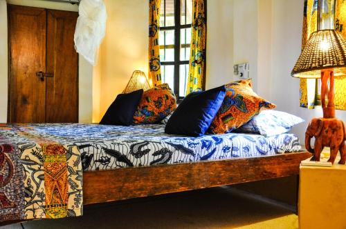 Ein Bett oder Betten in einem Zimmer der Unterkunft Ankobra Beach Resort