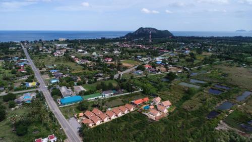 an aerial view of a town with a mountain at Chang Noi Hua Hin Pranburi fully accessible barrierefrei resort in Ban Nong Sua